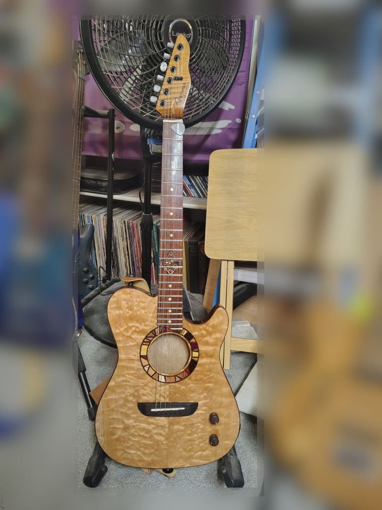 Sho0rthorn
Tele shaped acoustic/electric guitar