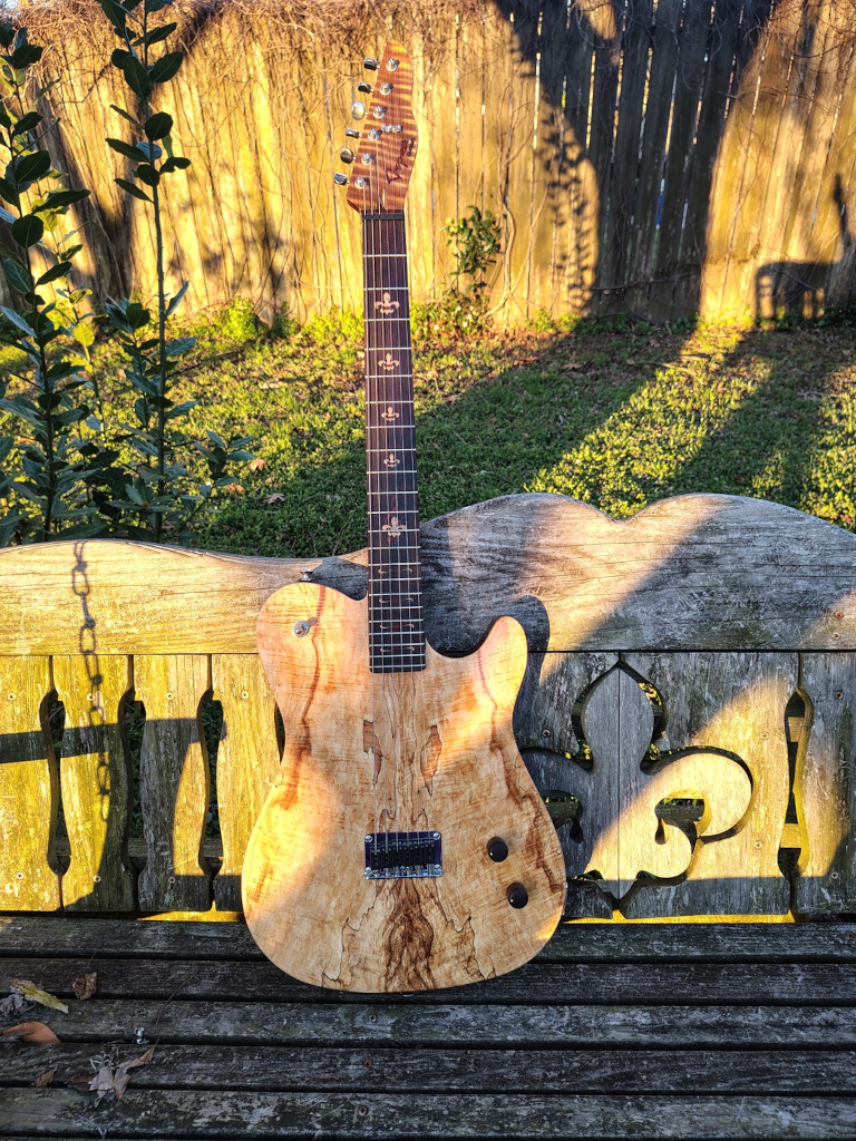 Shorthorn Tele shaped "stealth" (no
visible pickups) guitar
