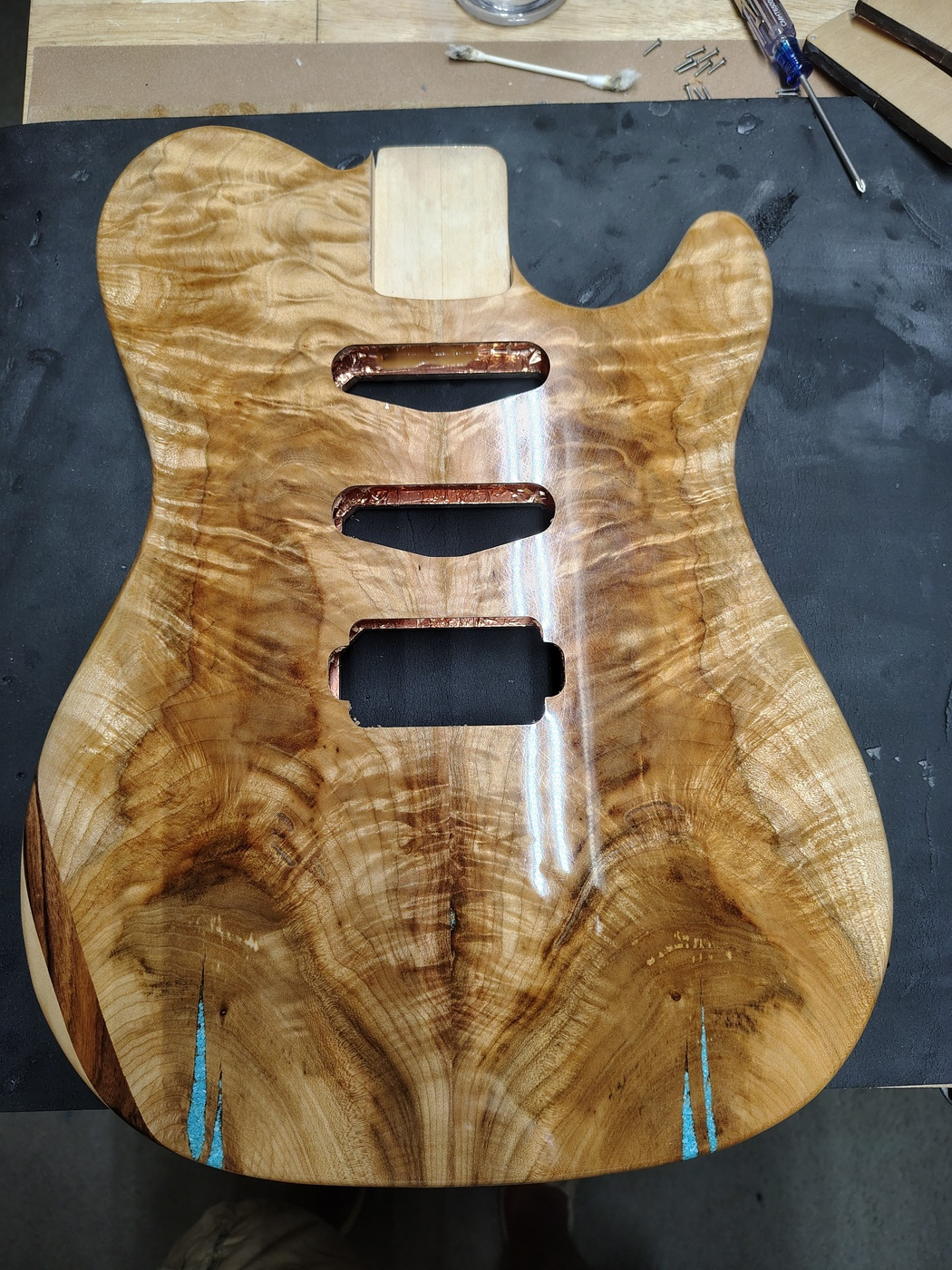Top of guitar with pickup
routs