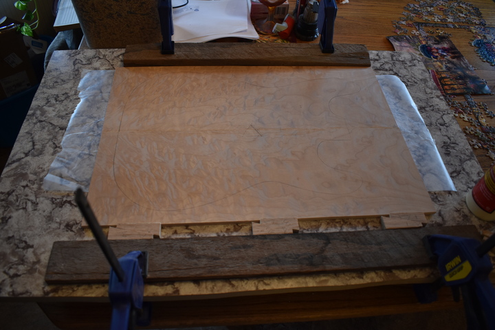 Book-matched drop top pieces being glued
                together